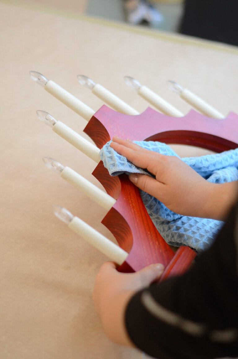 Clean your advent candelabra with a microfiber cloth