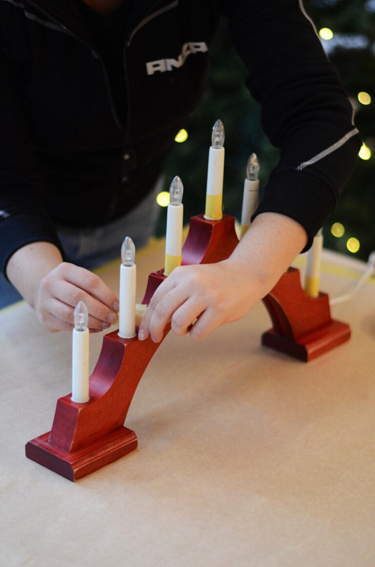 Mask the candles on the Advent candle holder.