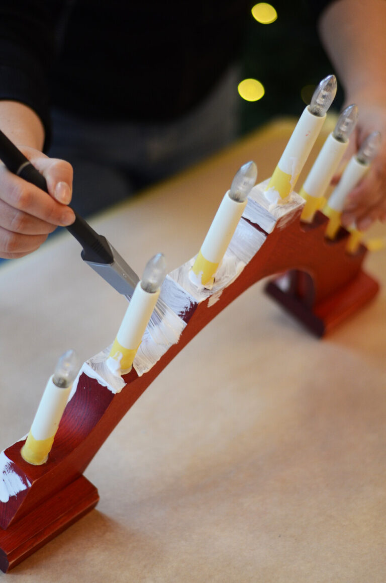 Priming with adhesion primer on the Advent candle holder.