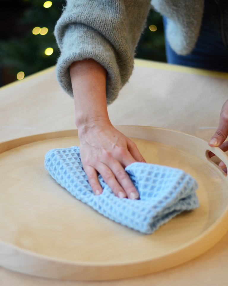 Wiping off sanding dust